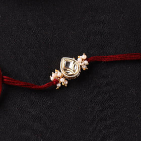 Handcrafted Kundan Rakhi for Brother with Potli 23