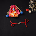 Handcrafted Kundan Rakhi for Brother with Potli 24