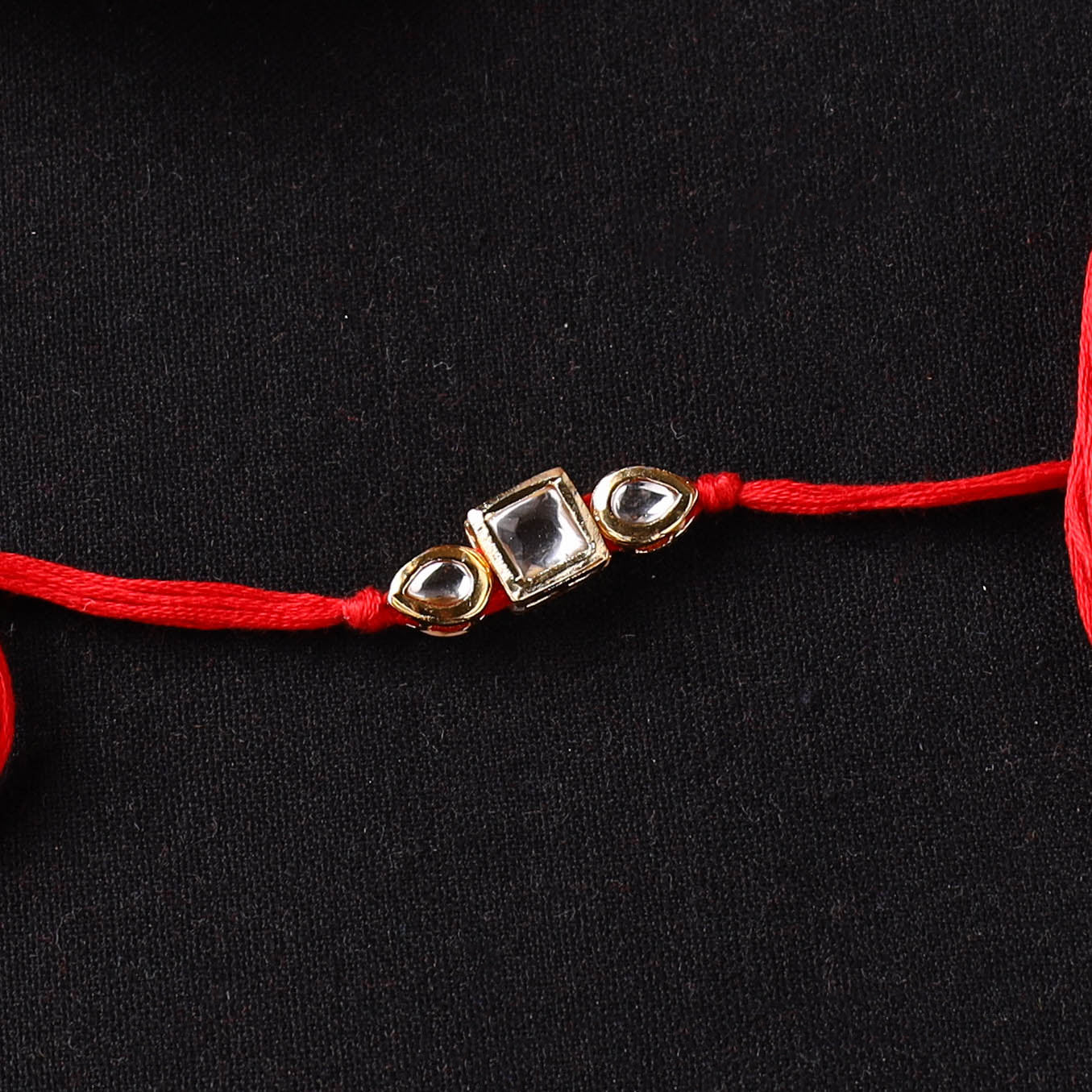 Handcrafted Kundan Rakhi for Brother with Potli 24