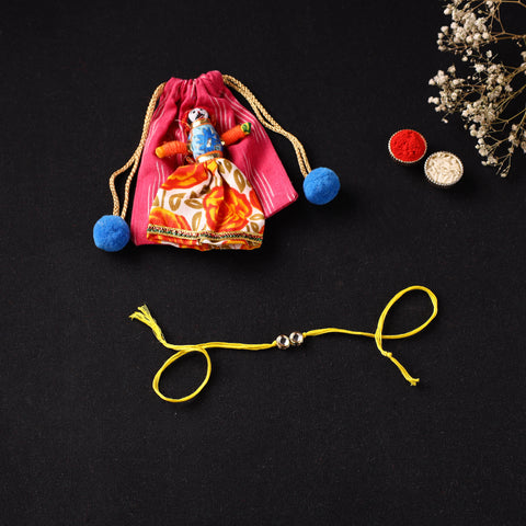 Handcrafted Kundan Rakhi for Brother with Potli 25