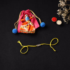 Handcrafted Kundan Rakhi for Brother with Potli 25