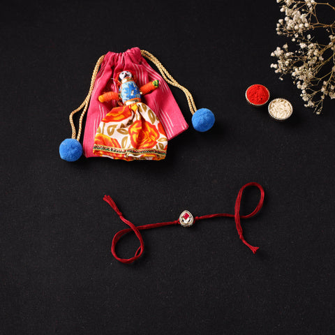 Handcrafted Kundan Rakhi for Brother with Potli 26