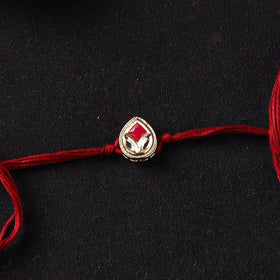 Handcrafted Kundan Rakhi for Brother with Potli 26
