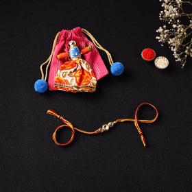 Handcrafted Kundan Rakhi for Brother with Potli 27