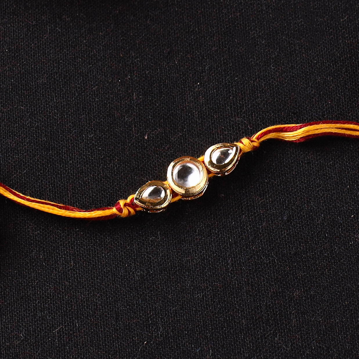 Handcrafted Kundan Rakhi for Brother with Potli 27
