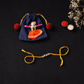 Handcrafted Kundan Rakhi for Brother with Potli 28