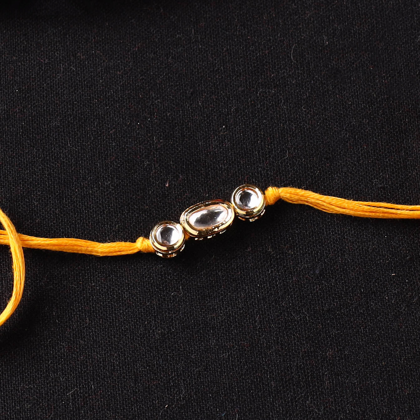 Handcrafted Kundan Rakhi for Brother with Potli 28