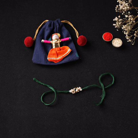 Handcrafted Kundan Rakhi for Brother with Potli 29