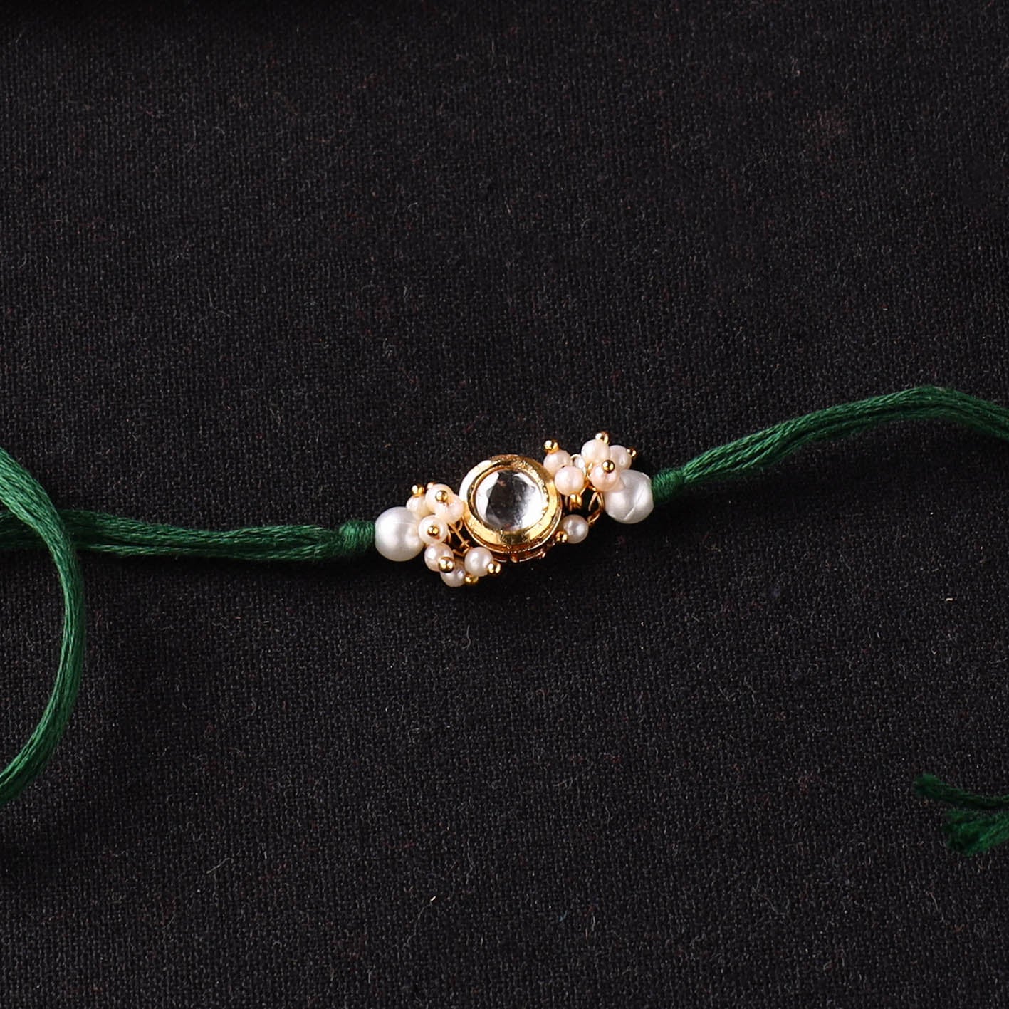 Handcrafted Kundan Rakhi for Brother with Potli 29