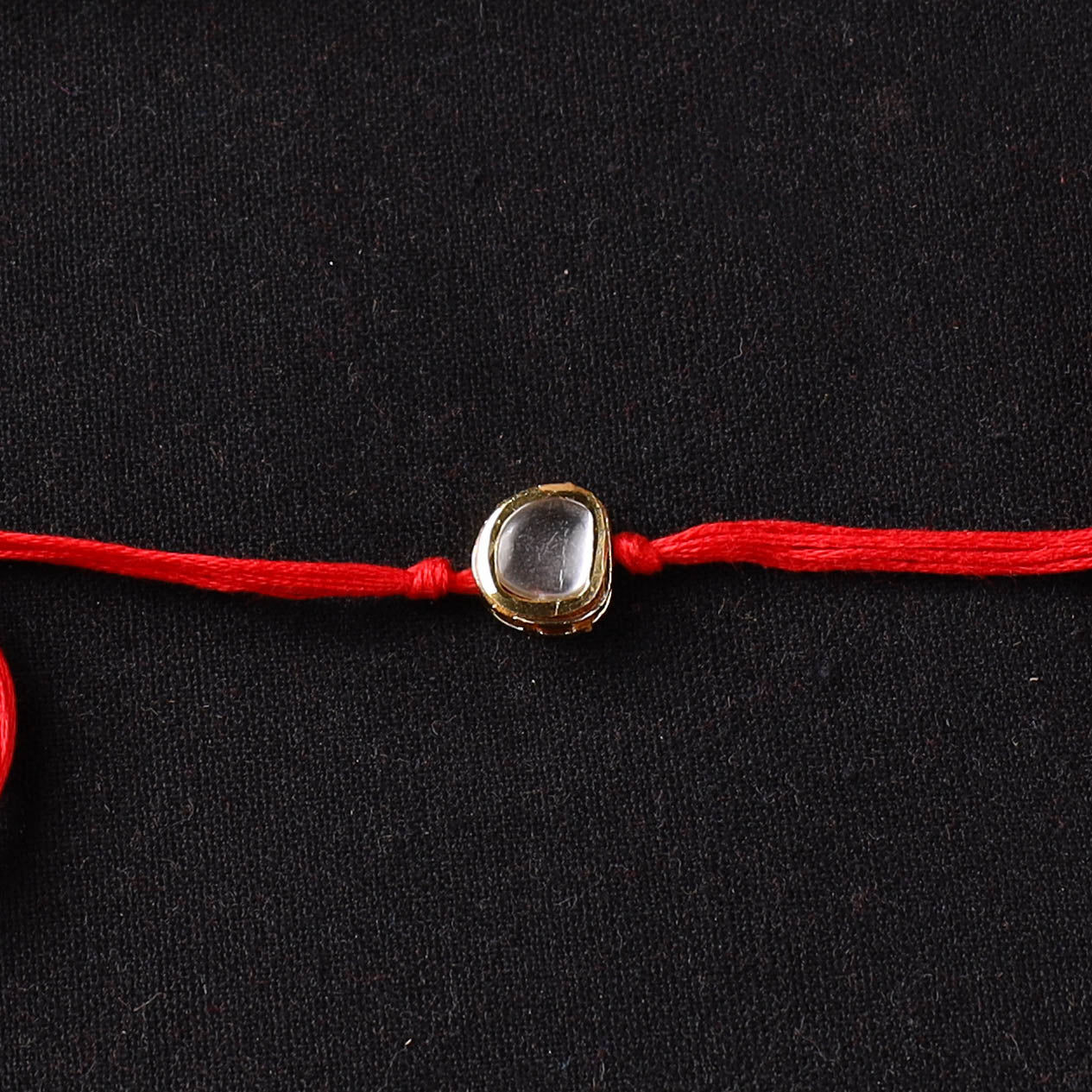 Handcrafted Kundan Rakhi for Brother with Potli 30