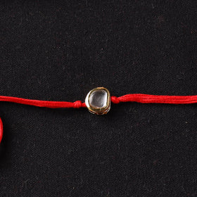 Handcrafted Kundan Rakhi for Brother with Potli 30