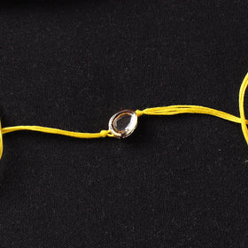 Handcrafted Kundan Rakhi for Brother with Potli 31