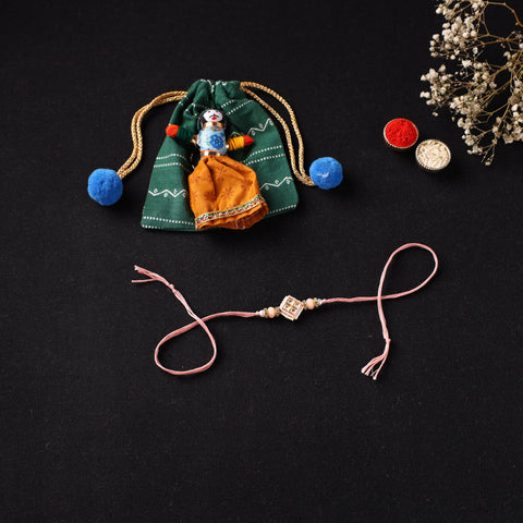 Handcrafted Kundan Beaded Rakhi for Brother with Potli 37