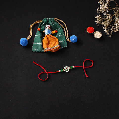 Handcrafted Kundan Beaded Rakhi for Brother with Potli 38