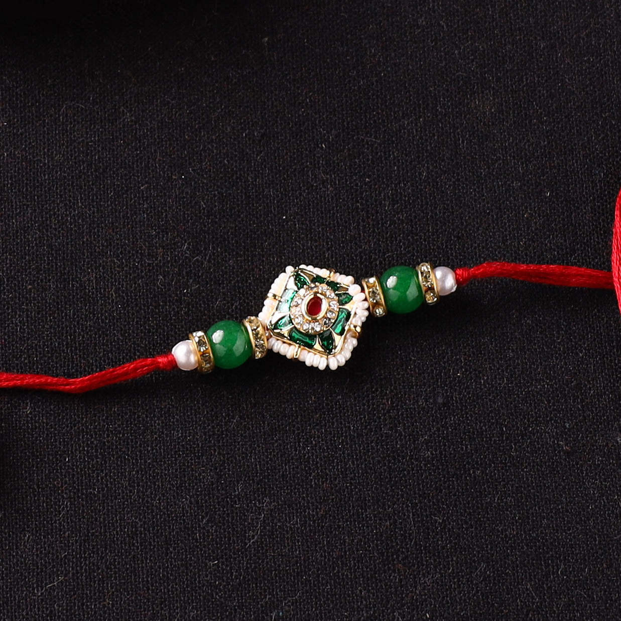 Handcrafted Kundan Beaded Rakhi for Brother with Potli 38