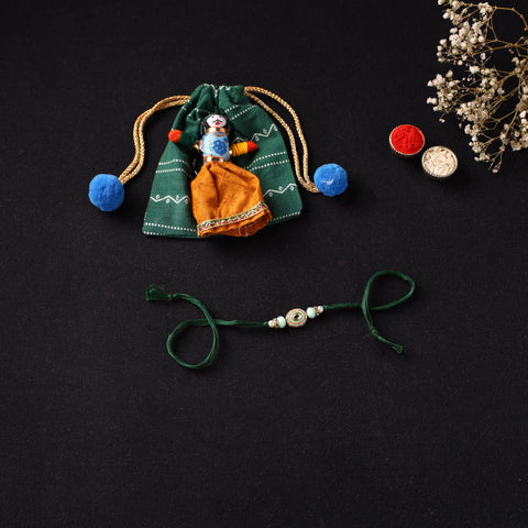 Handcrafted Kundan Beaded Rakhi for Brother with Potli 39