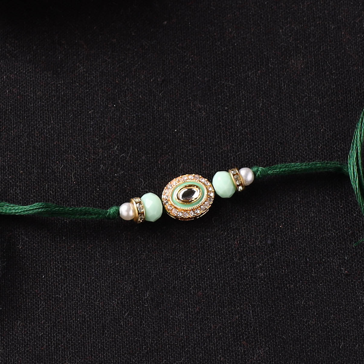 Handcrafted Kundan Beaded Rakhi for Brother with Potli 39