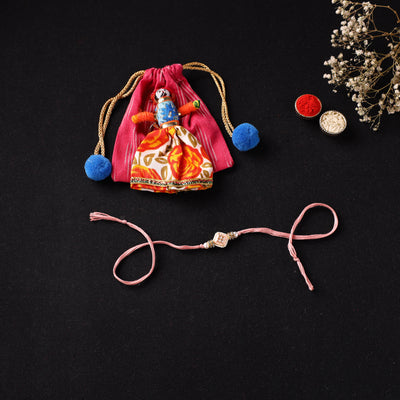 Handcrafted Kundan Beaded Rakhi for Brother with Potli 40