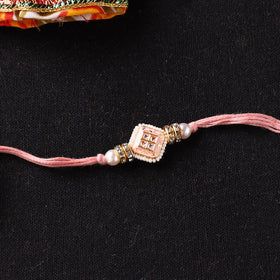 Handcrafted Kundan Beaded Rakhi for Brother with Potli 40