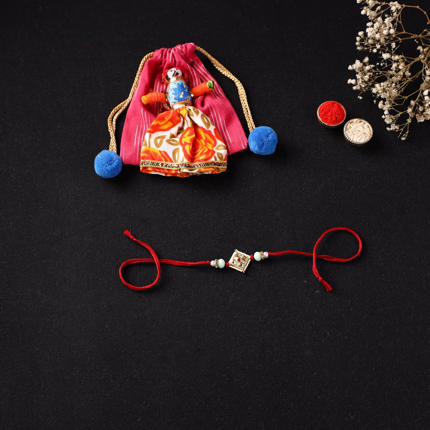 Handcrafted Kundan Beaded Rakhi for Brother with Potli 41