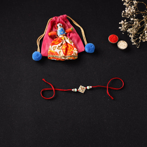 Handcrafted Kundan Beaded Rakhi for Brother with Potli 41