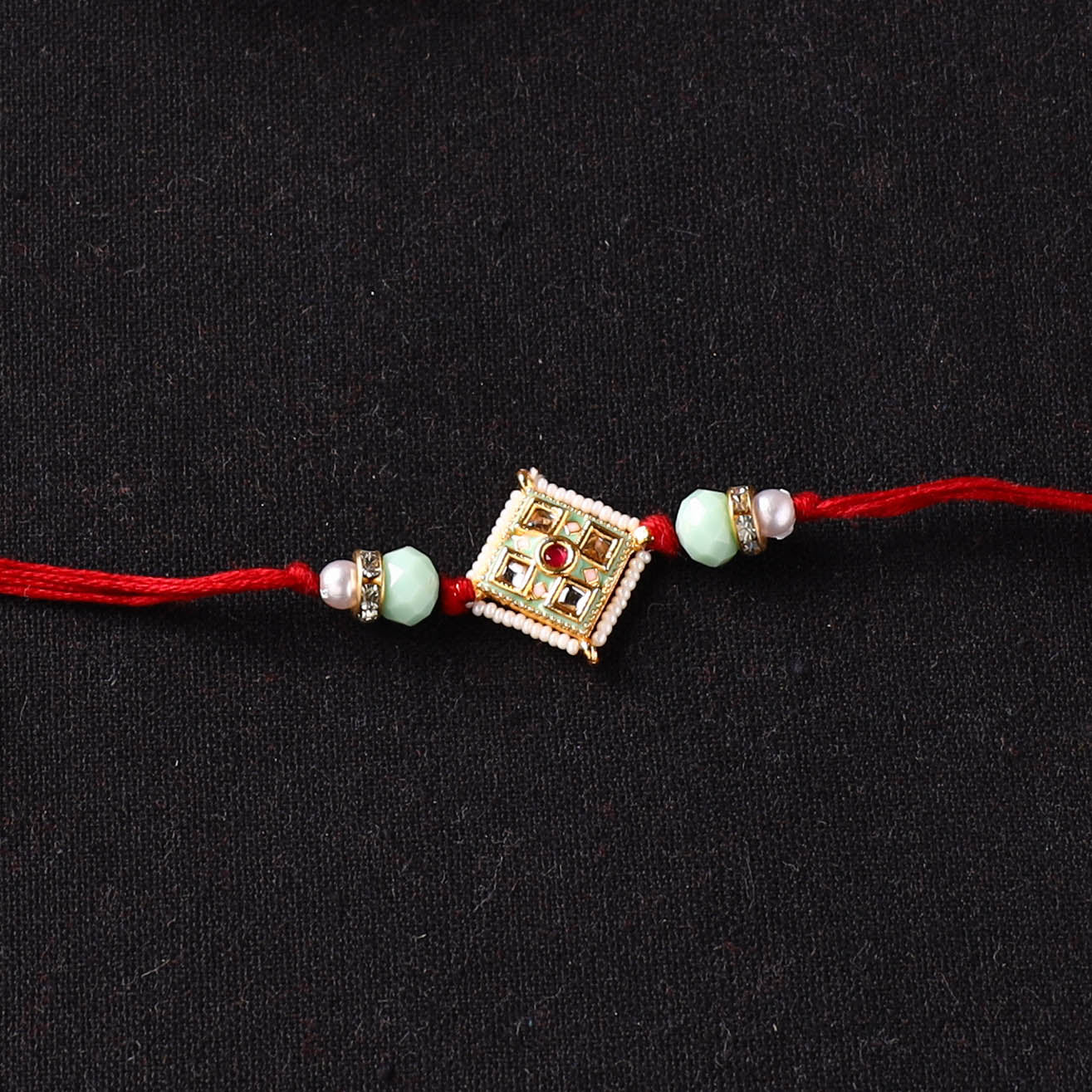 Handcrafted Kundan Beaded Rakhi for Brother with Potli 41