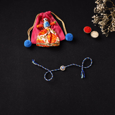Handcrafted Kundan Beaded Rakhi for Brother with Potli 42