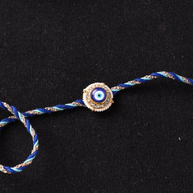 Handcrafted Kundan Beaded Rakhi for Brother with Potli 42