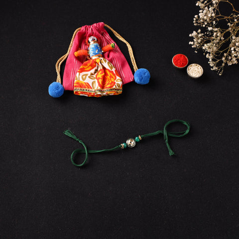 Handcrafted Kundan Beaded Rakhi for Brother with Potli 43
