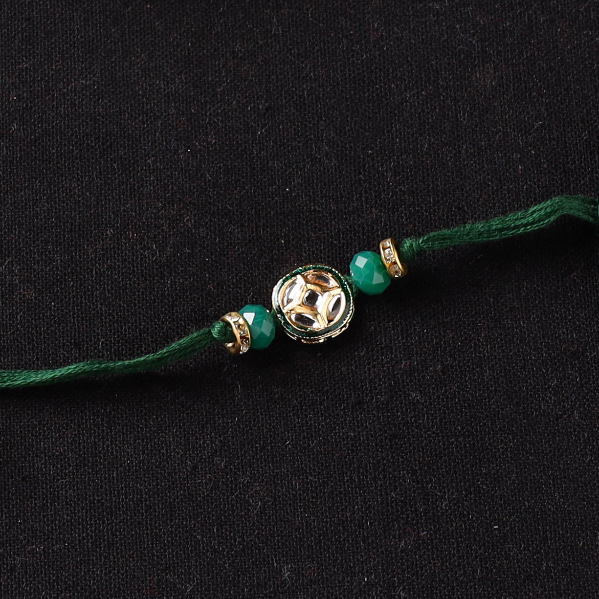 Handcrafted Kundan Beaded Rakhi for Brother with Potli 43