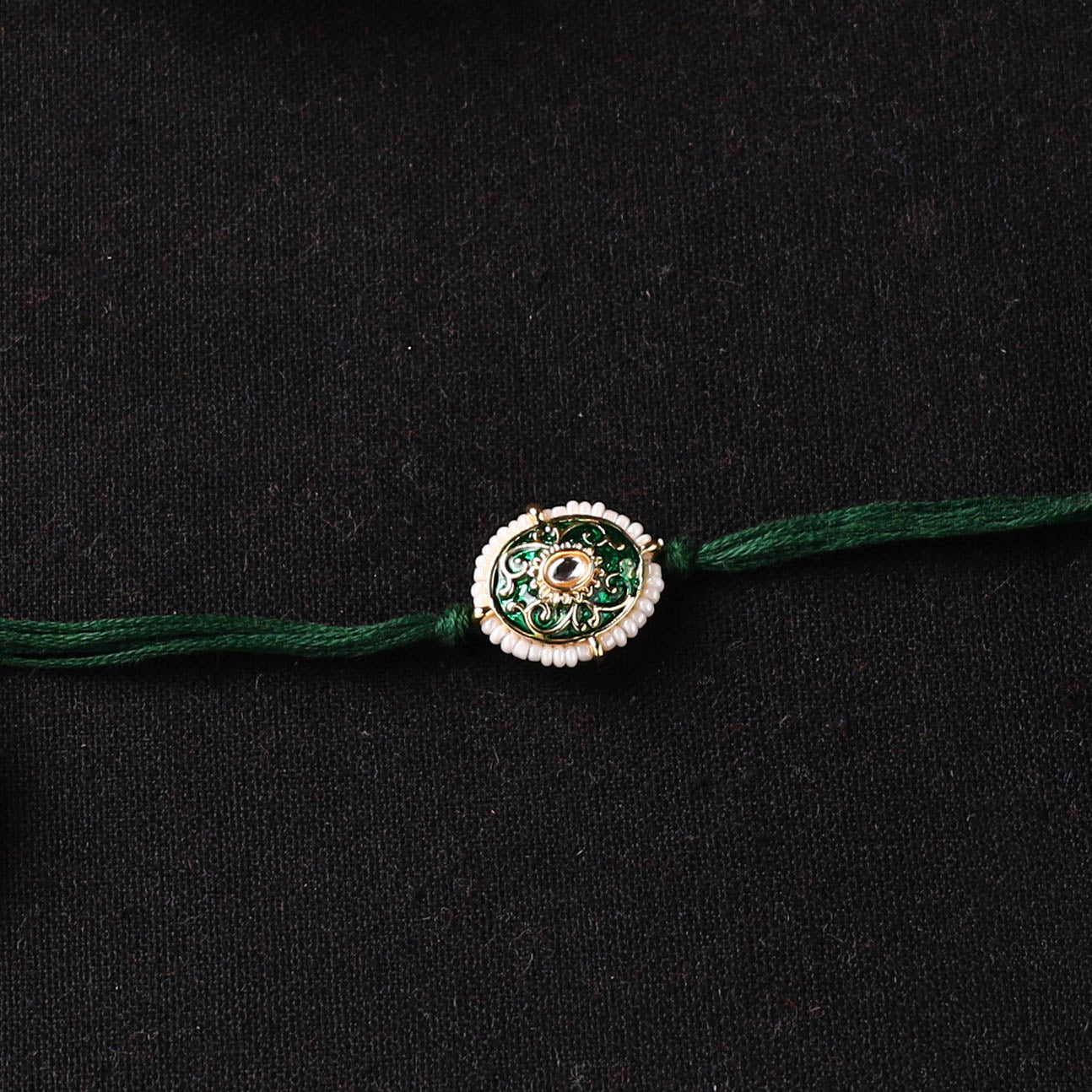 Handcrafted Kundan Beaded Rakhi for Brother with Potli 44