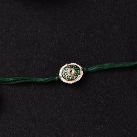 Handcrafted Kundan Beaded Rakhi for Brother with Potli 44
