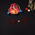 Handcrafted Kundan Beaded Rakhi for Brother with Potli 46