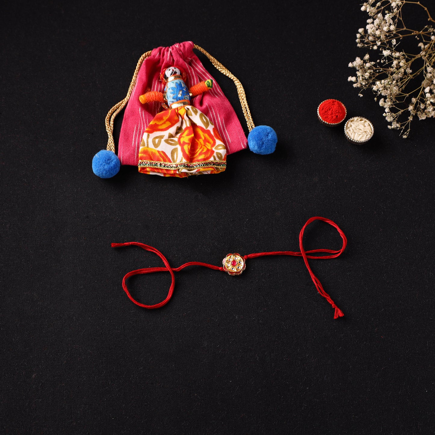 Handcrafted Kundan Beaded Rakhi for Brother with Potli 46
