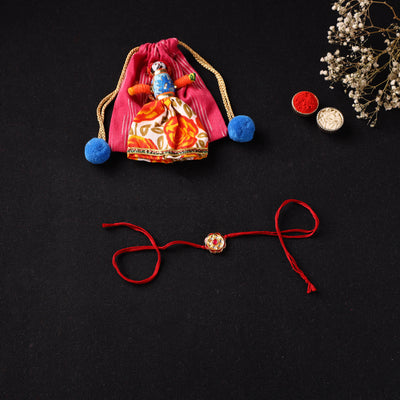 Handcrafted Kundan Beaded Rakhi for Brother with Potli 46