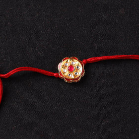 Handcrafted Kundan Beaded Rakhi for Brother with Potli 46