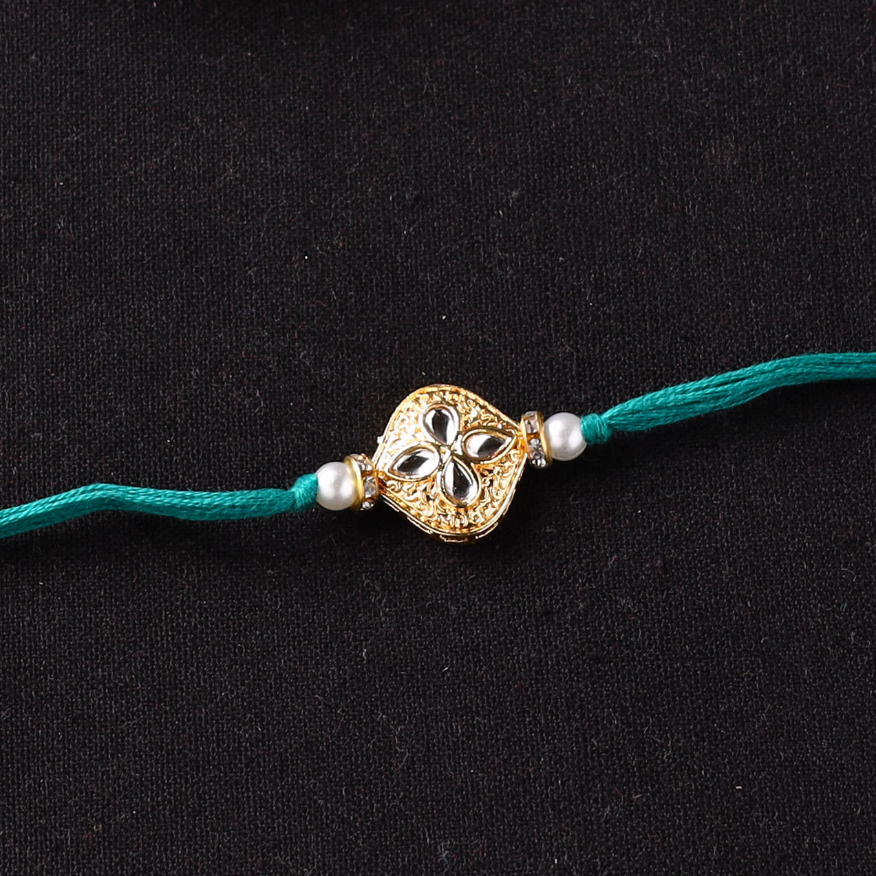 Handcrafted Kundan Beaded Rakhi for Brother with Potli 47