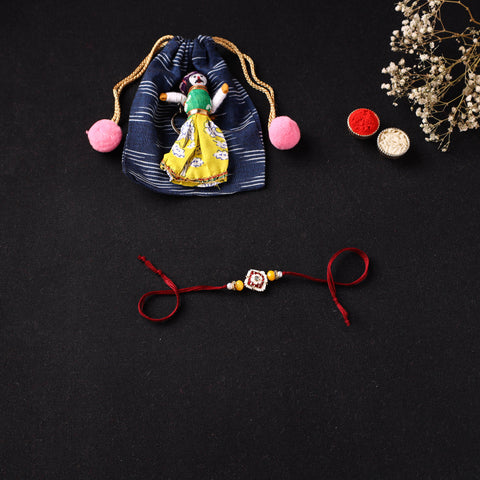 Handcrafted Kundan Beaded Rakhi for Brother with Potli 48