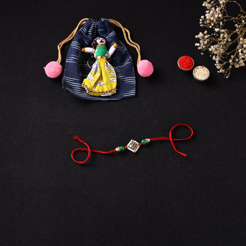 Handcrafted Kundan Beaded Rakhi for Brother with Potli 49