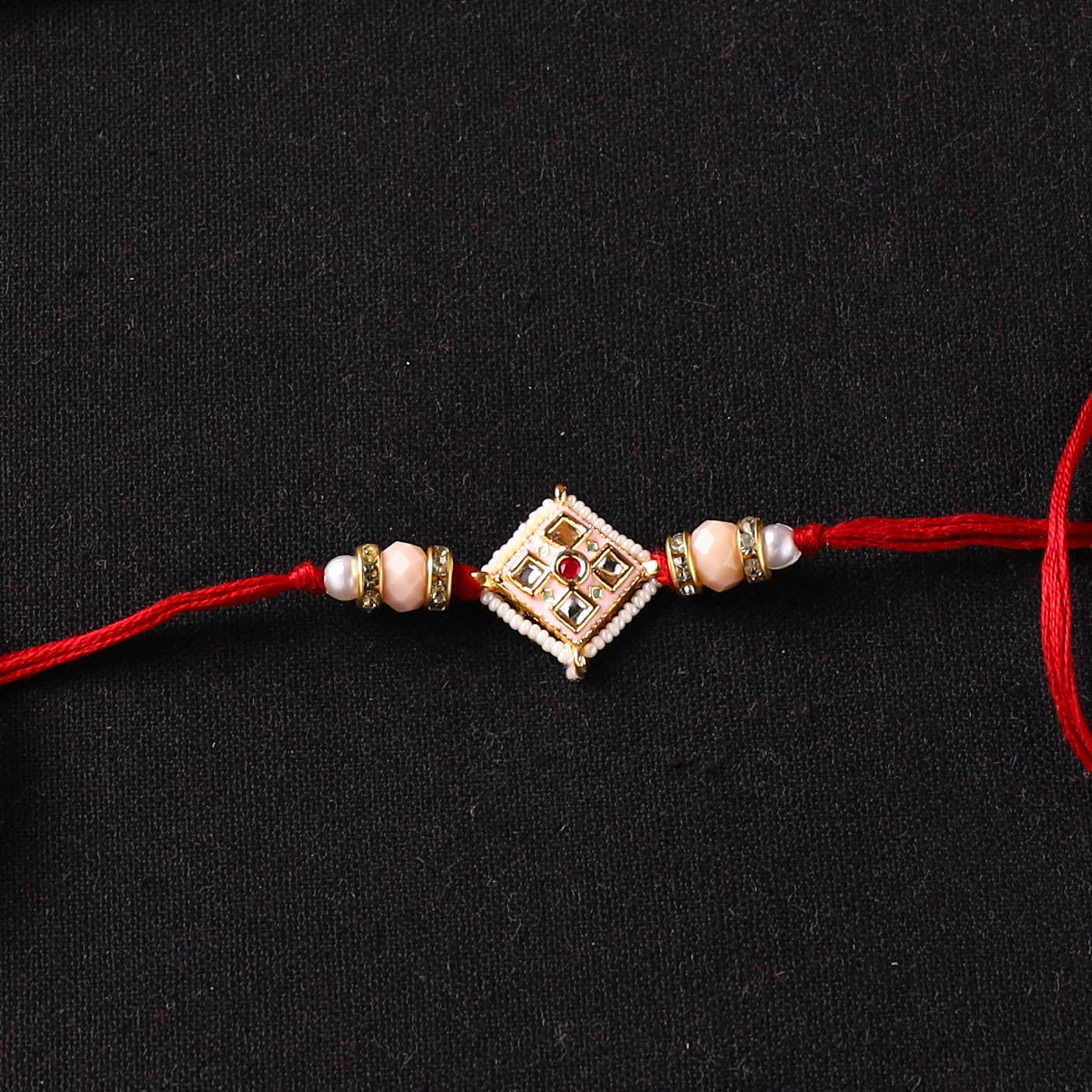 Handcrafted Kundan Beaded Rakhi for Brother with Potli 50