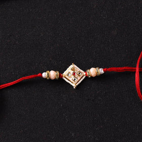 Handcrafted Kundan Beaded Rakhi for Brother with Potli 50