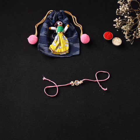 Handcrafted Kundan Beaded Rakhi for Brother with Potli 51