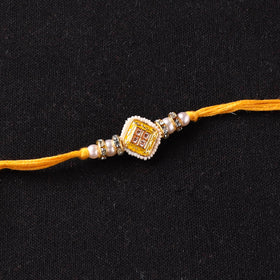 Handcrafted Kundan Beaded Rakhi for Brother with Potli 52