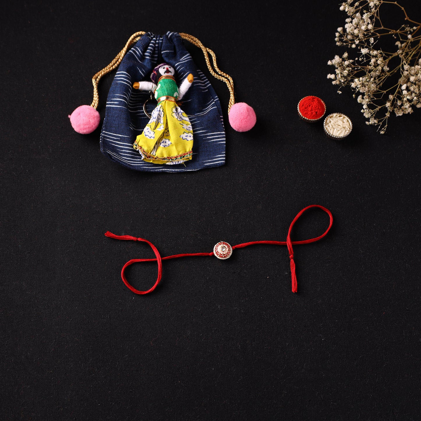 Handcrafted Kundan Beaded Rakhi for Brother with Potli 53
