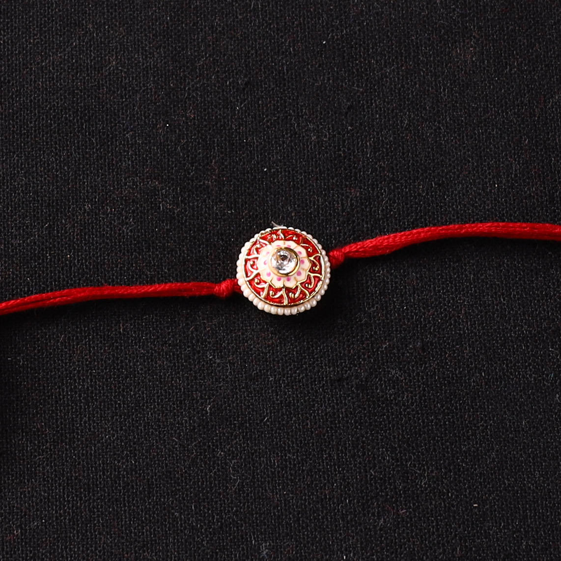 Handcrafted Kundan Beaded Rakhi for Brother with Potli 53
