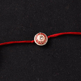 Handcrafted Kundan Beaded Rakhi for Brother with Potli 53