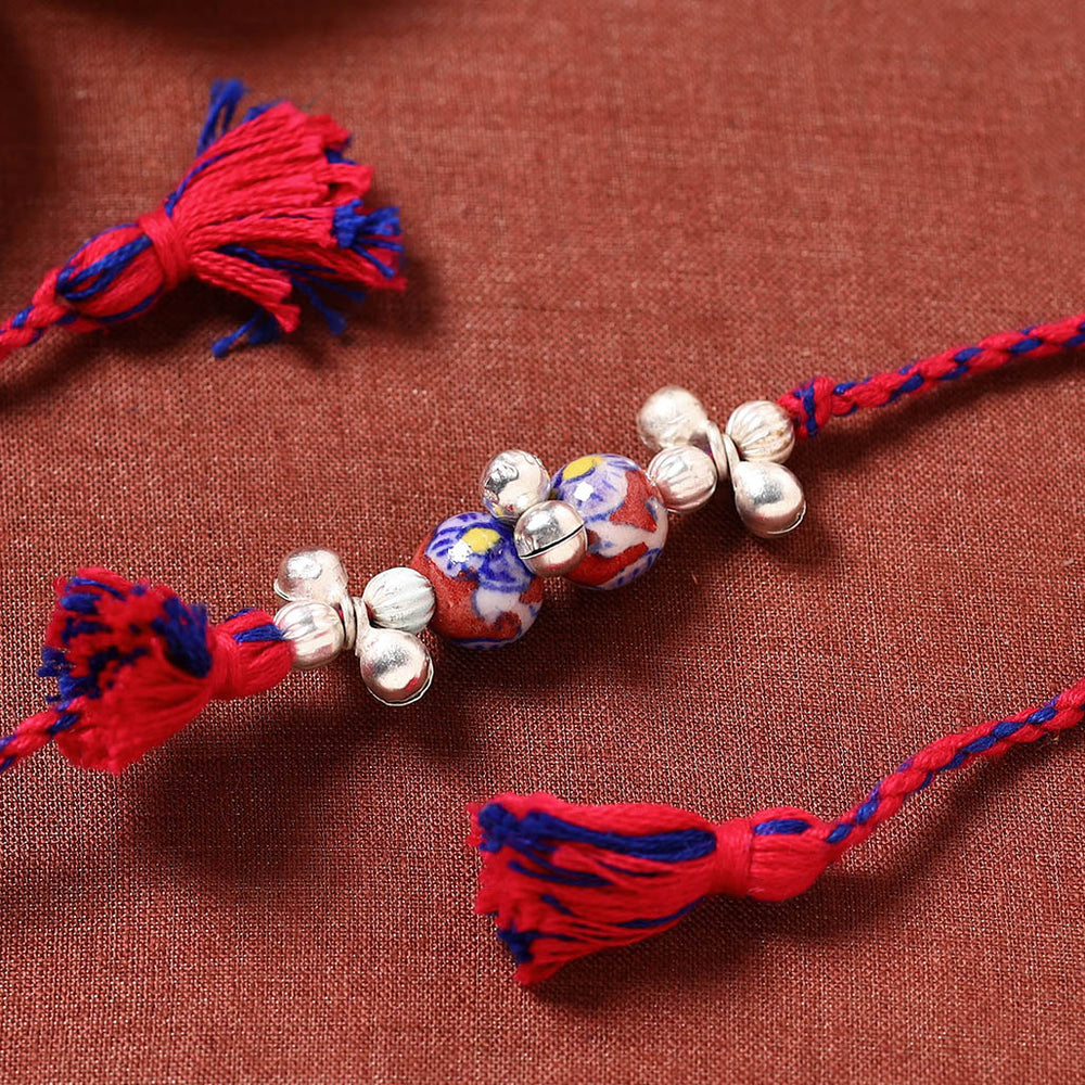 Patwa Threadwork Blue Pottery Beads Rakhi 