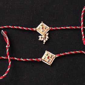 Handcrafted Kundan Beaded Bhaiya Bhabhi Rakhi Set with Potli 63