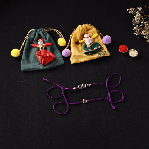 Handcrafted Kundan Bhaiya Bhabhi Rakhi Set with Potli 74
