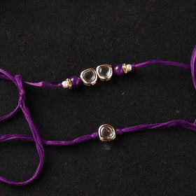 Handcrafted Kundan Bhaiya Bhabhi Rakhi Set with Potli 74